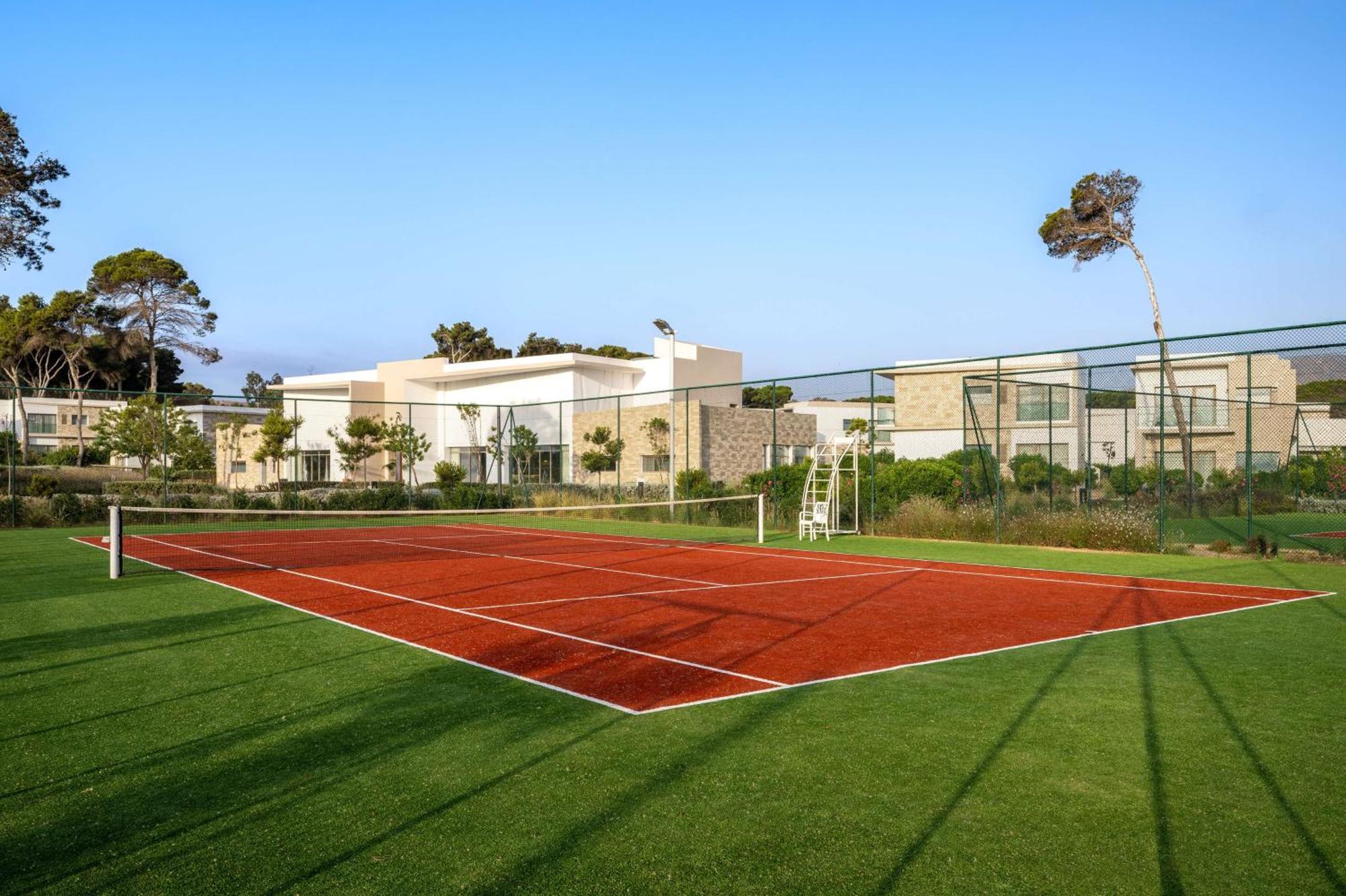 Radisson Blu Resort Аль-Хосейма Екстер'єр фото Tennis court