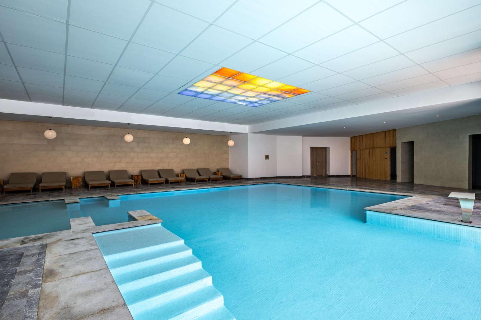 Radisson Blu Resort Аль-Хосейма Екстер'єр фото The swimming pool