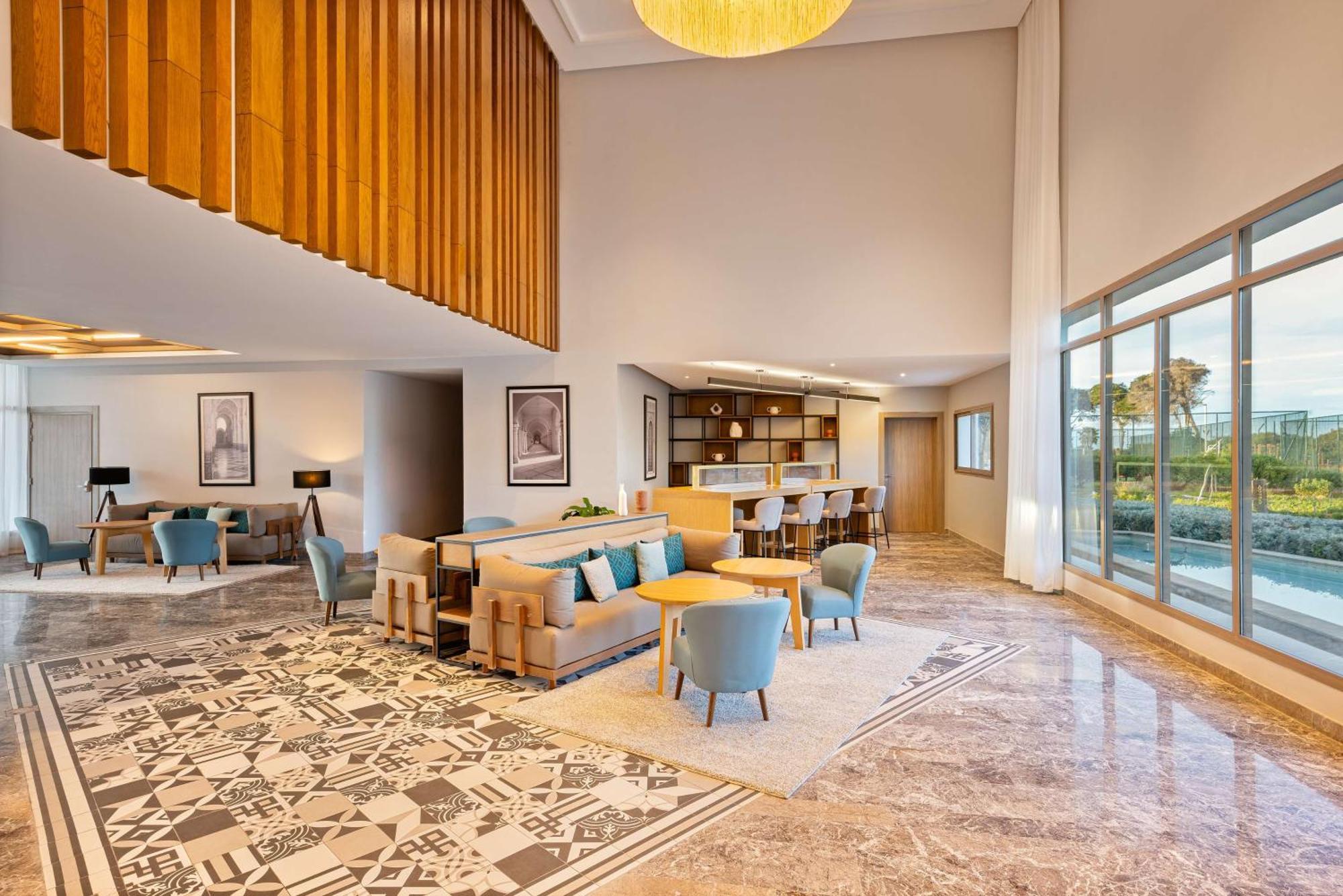 Radisson Blu Resort Аль-Хосейма Екстер'єр фото The lounge at the airport